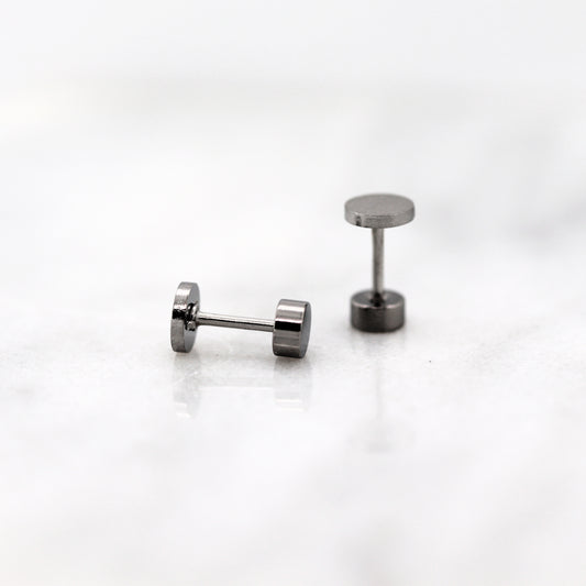 screw on back findings on a white background