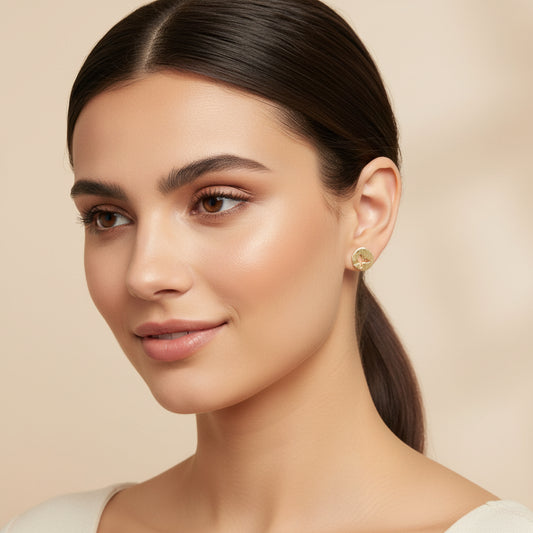 model wearing the bird on a branch golden earring