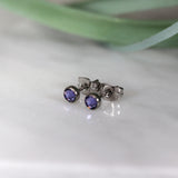 Titanium stud earrings, bezel set crystals, purple