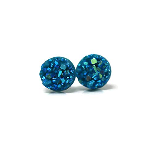 A pair of blue faux druzy stud earrings with a sparkling resin material.