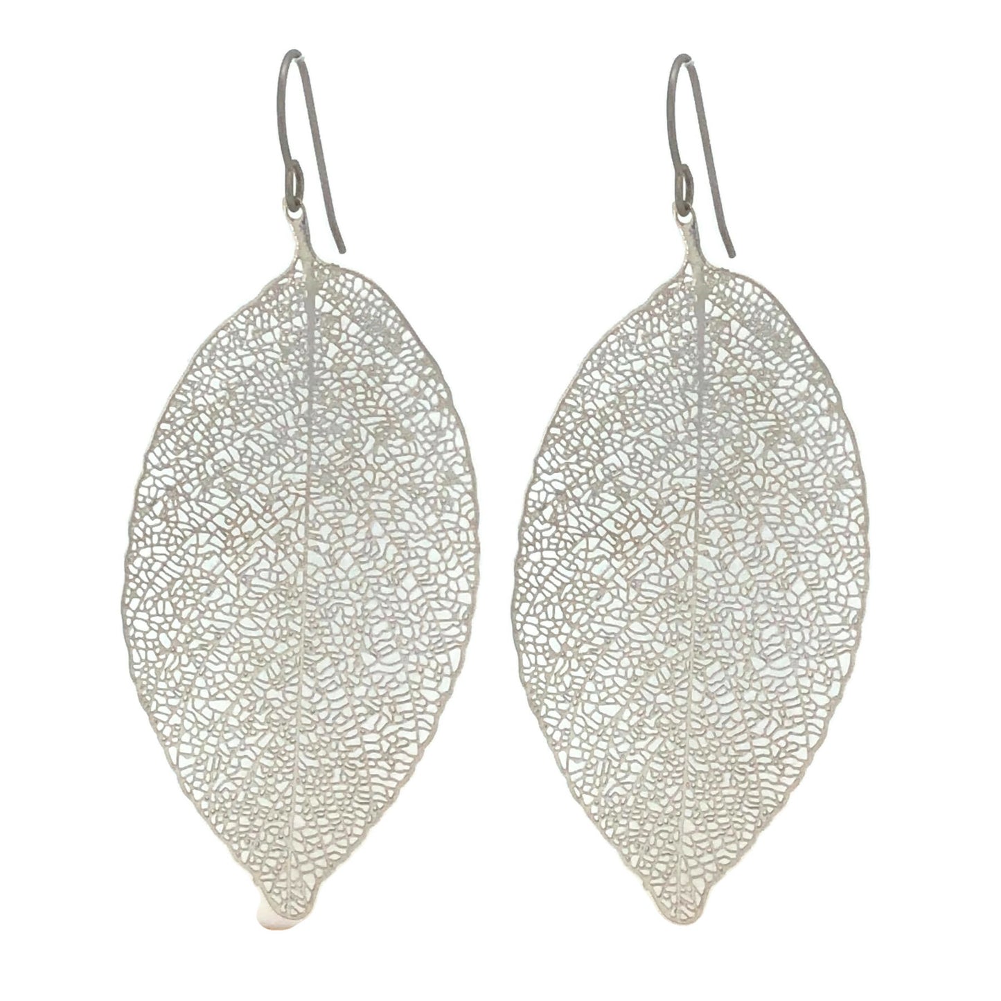 A pair of silver-colored leaf-shaped dangle earrings.