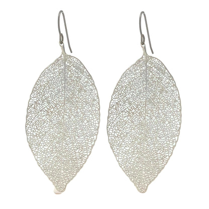A pair of silver-colored leaf-shaped dangle earrings.