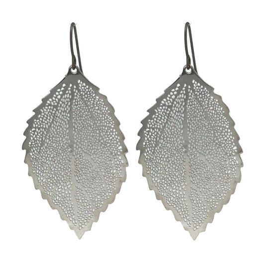 A pair of silver dangle earrings designed to resemble a leaf, with a textured surface and rounded edges.