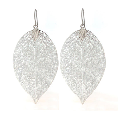 A pair of silver-colored leaf-shaped dangle earrings with a textured design.