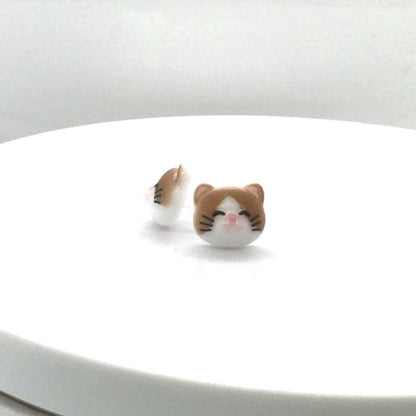 brown and white cat face earrings