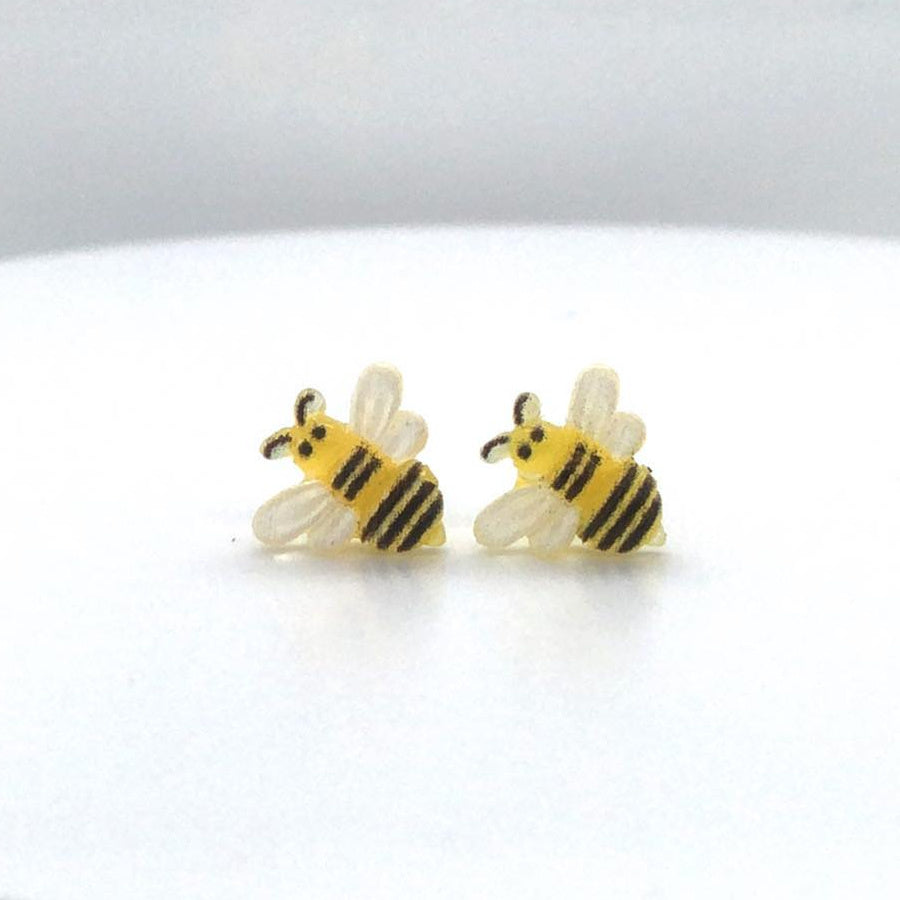 bee earrings close up