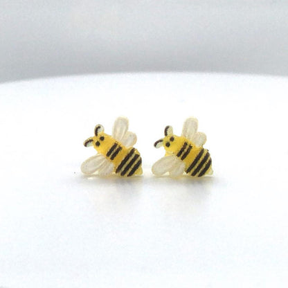 bee earrings close up