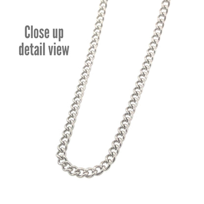 A close-up image of a 18K gold PVD plated stainless steel curb chain necklace, showcasing its texture and shine.