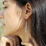 Boucles d'oreilles pendantes en forme de nœud porte-bonheur celtique