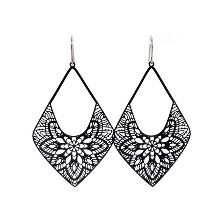 A pair of black lace diamond-shaped dangle earrings with invisible clip-on attachments.