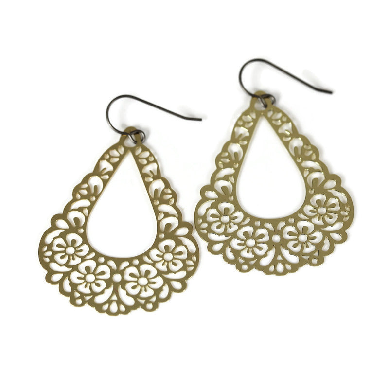 A pair of pink floral filigree teardrop dangle earrings.