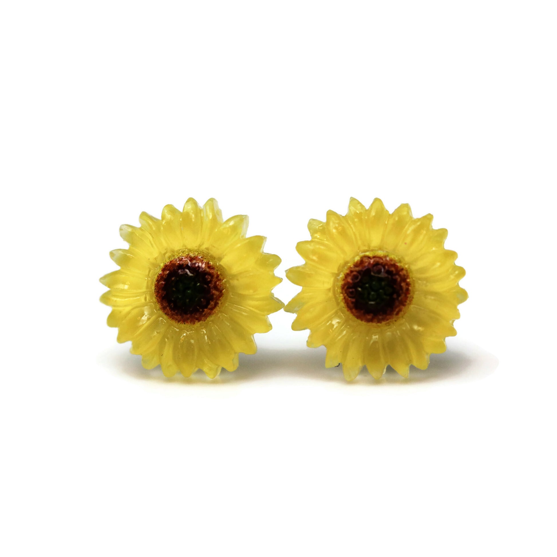 A pair of yellow sunflower stud earrings made from resin, displayed against a white background.