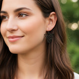 Boucles d'oreilles pendantes à fines lignes en forme de feuille de Monstera