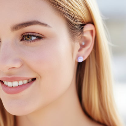 purple m&m earring in an ear