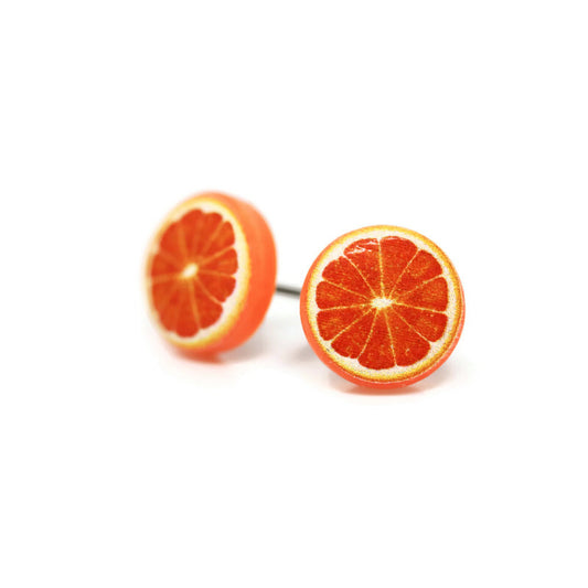 A pair of orange slice stud earrings made from resin, with options for different post styles suitable for pierced and non-pierced ears.