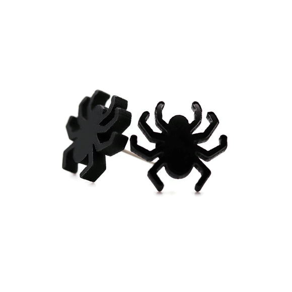 Black spider-shaped earrings on a white background
