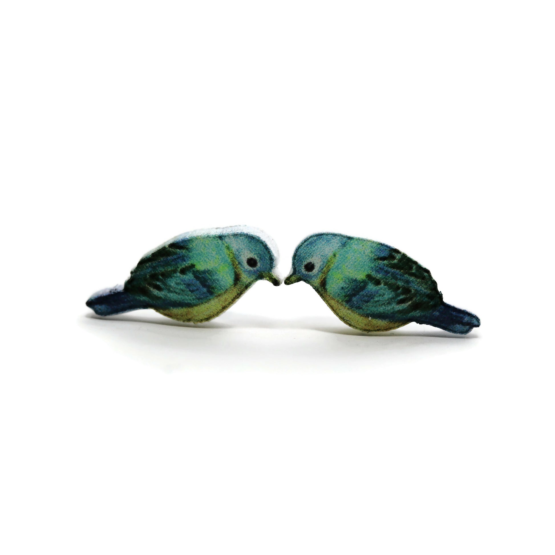 A pair of aqua blue bird stud earrings made from resin, displayed against a white background.