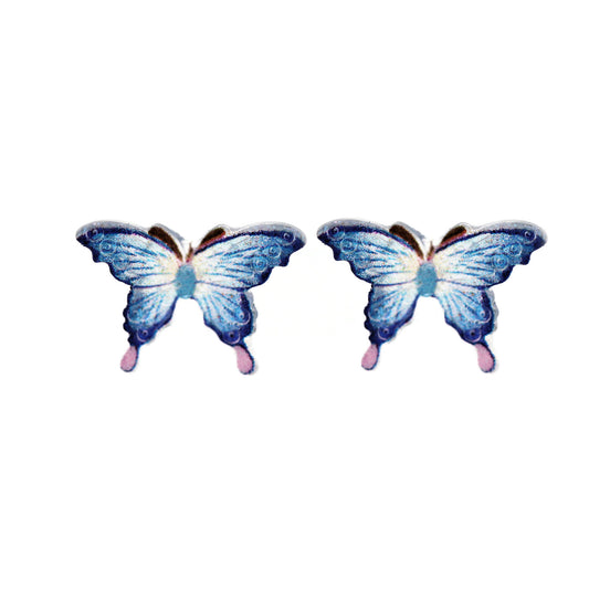 Pair of blue butterfly earrings on a white background