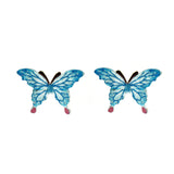 Pair of blue butterfly earrings on a white background