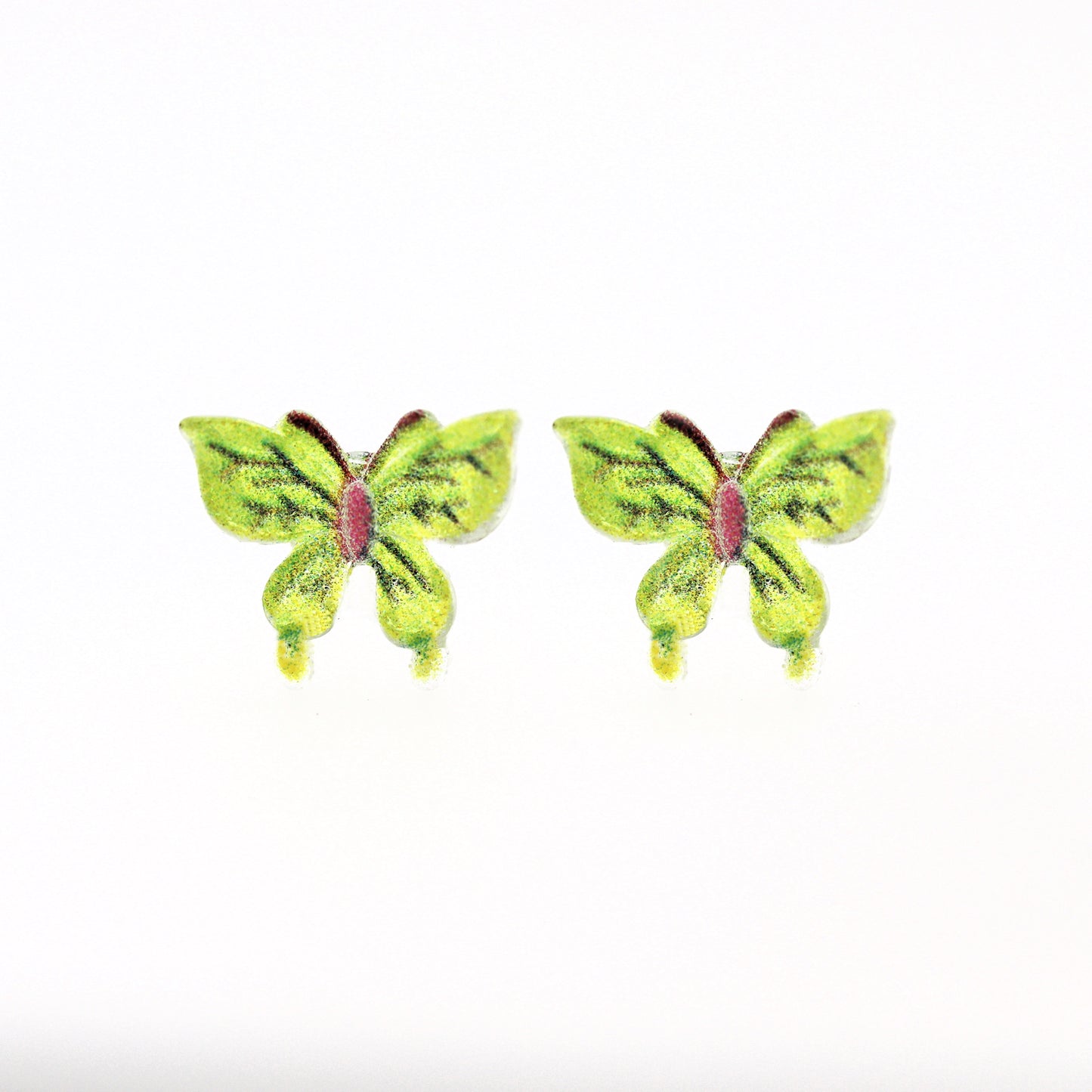 Butterfly-shaped earrings on a white background