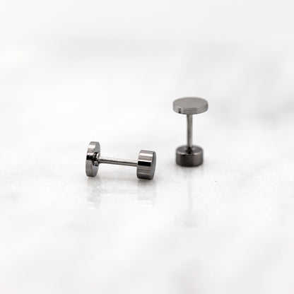 screw on back findings on a white background
