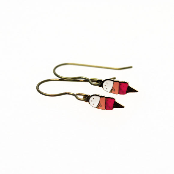 Pair of earrings with colorful ice cream cone design on a white background