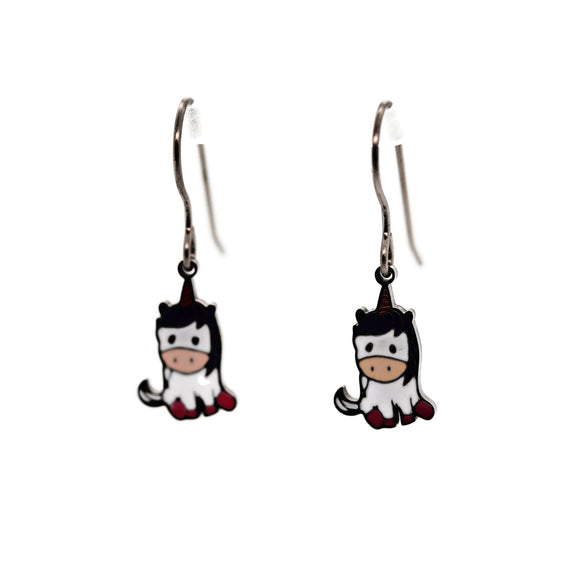 Pair of cartoon unicorn-shaped earrings on a white background