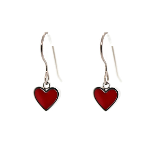 Red heart-shaped earrings on a white background