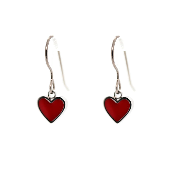 Red heart-shaped earrings on a white background