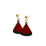 Watermelon slice earrings on a white background