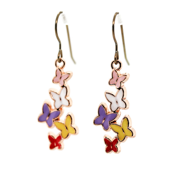 Butterfly-shaped earrings with colorful wings on a white background
