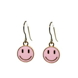 Pink smiley face earrings on a white background