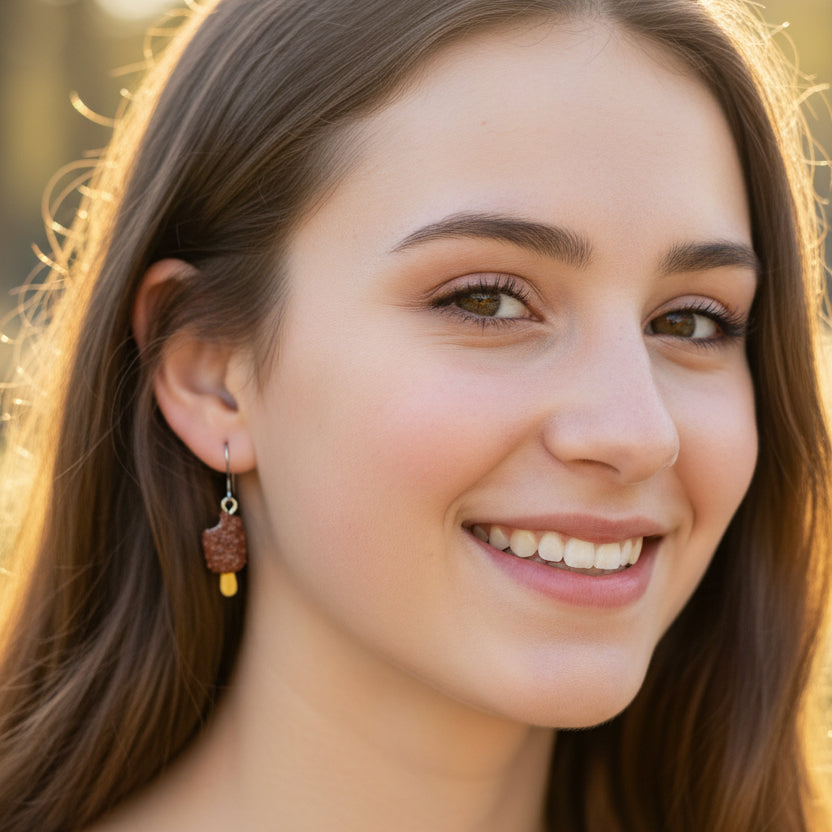 Boucles d'oreilles pendantes en forme de feuille délicate