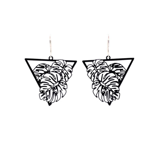A pair of dangle earrings featuring a fine line monstera leaf design, with a black metal finish.