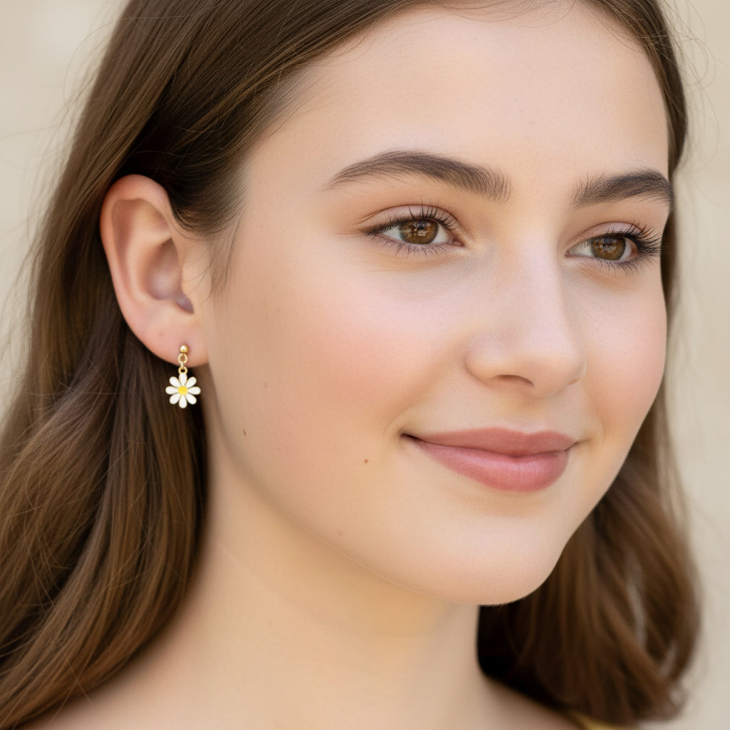 Close-up of an ear wearing a daisy-shaped earring with a blurred background