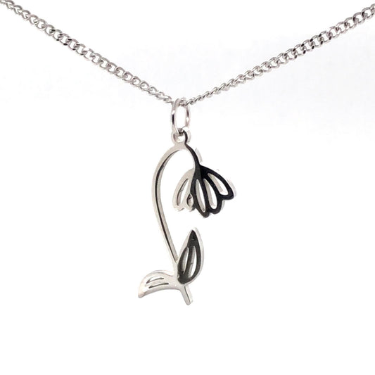 A gold-colored stainless steel necklace with a birth month flower charm.
