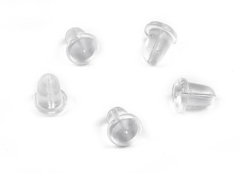 clear rubber earring backs designed to fit titanium posts, displayed on a white background.
