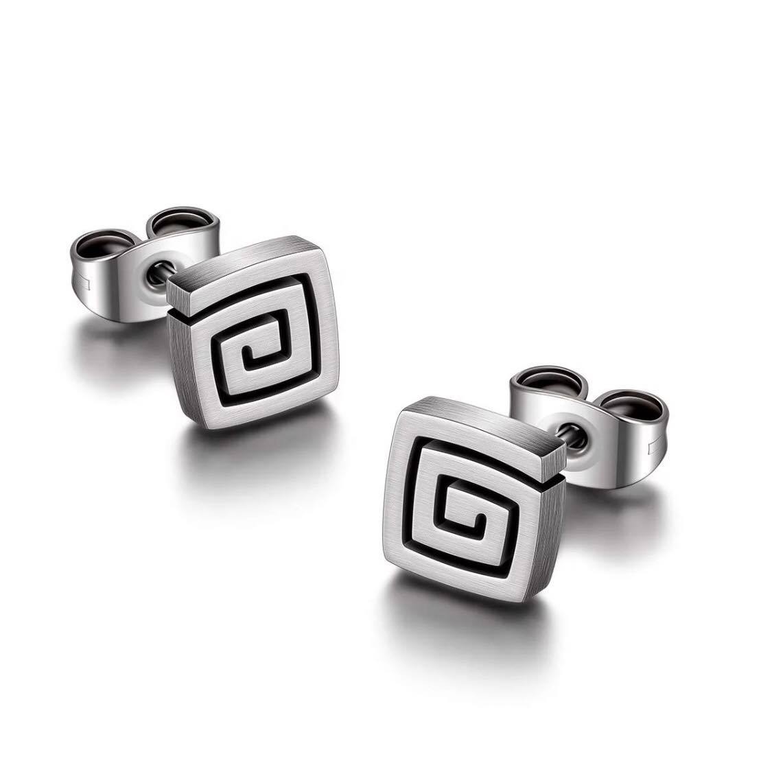 A pair of square spiral stud earrings made of pure titanium, displayed against a white background.