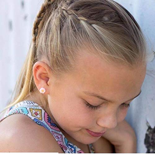 white daisy earring on an ear model