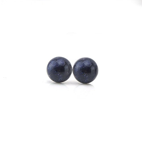 A pair of blue goldstone stud earrings with a dome-shaped, dark midnight blue appearance, set against a white background.