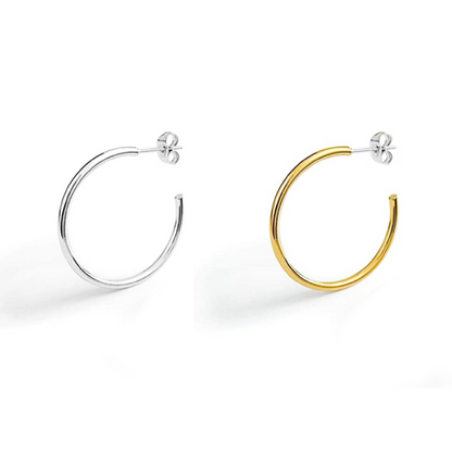 A pair of 30mm hoop stud earrings, one with a silver finish and the other with a gold plated copper finish.