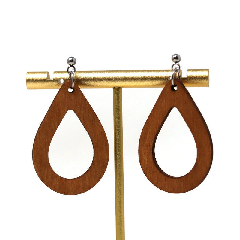 A pair of wood open teardrop dangle earrings with a gold-colored metal post and plastic hooks.