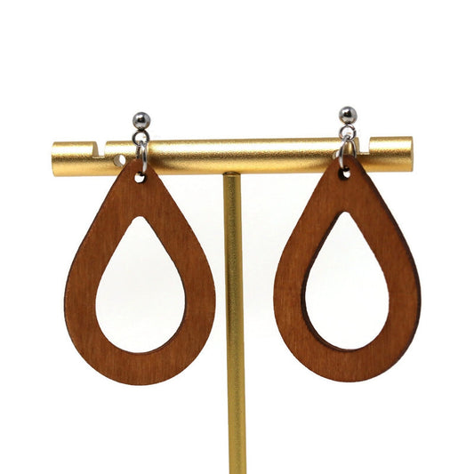 A pair of wood open teardrop dangle earrings with a gold-colored metal post and plastic hooks.