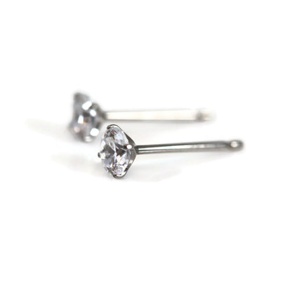 A pair of titanium martini set cubic zirconia stud earrings.