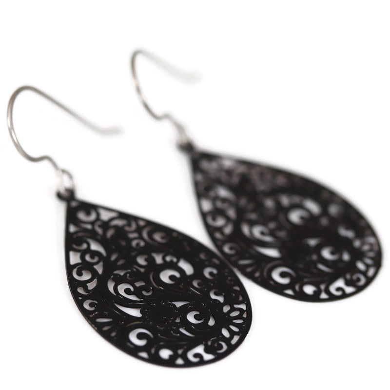 A pair of black filigree teardrop dangle earrings with a plastic hook for metal-sensitive ears.