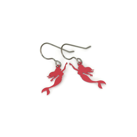 A pair of red mermaid dangle earrings with clip-on plastic hooks.