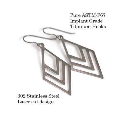 A pair of stainless steel geometric rhombus dangle earrings with a plastic hook.