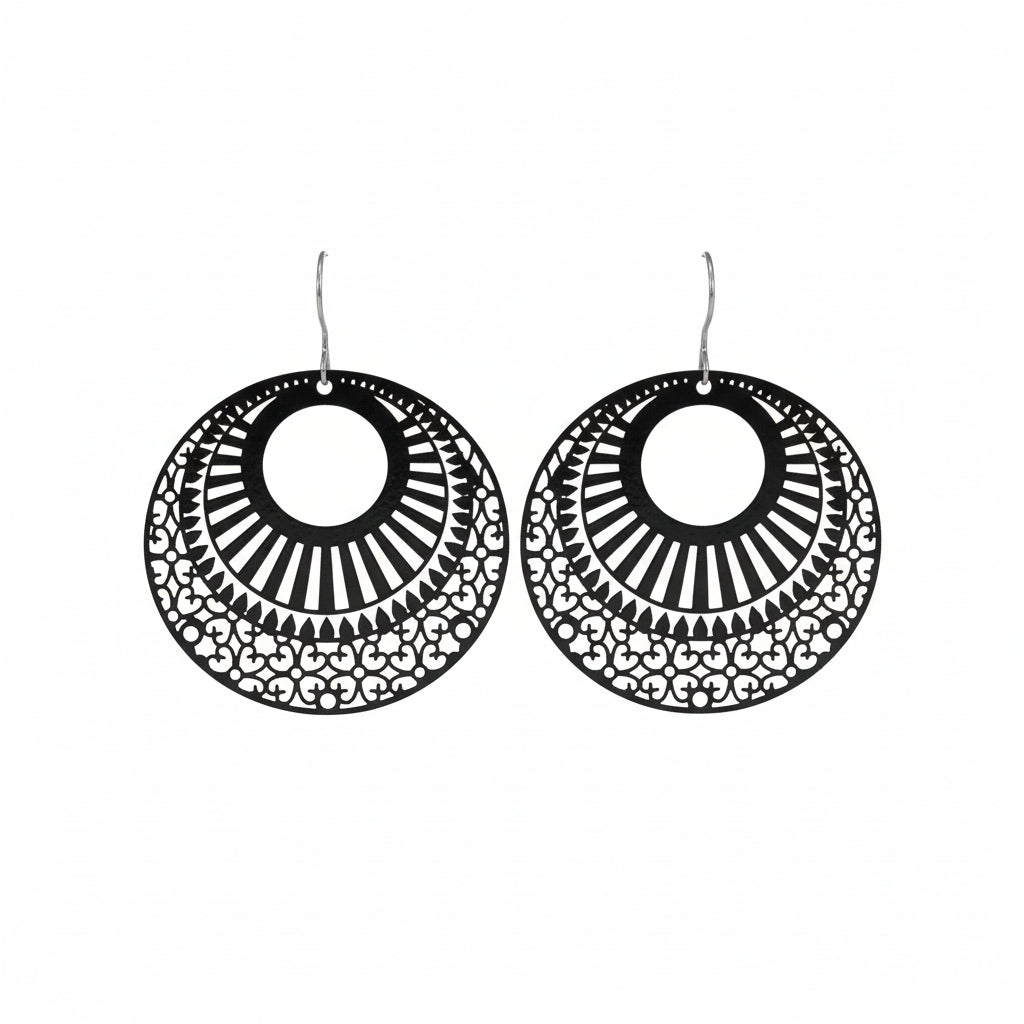 A pair of laser cut filigree dangle earrings in black color with a circular design a