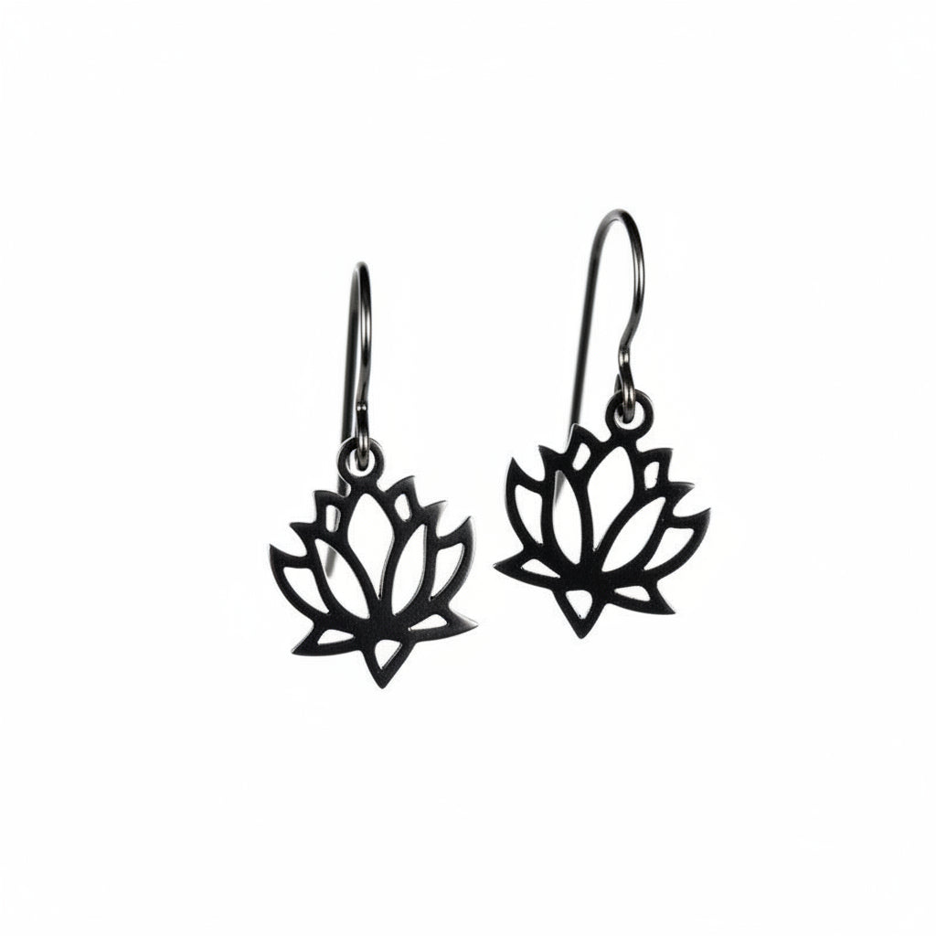 A pair of dangle earrings with a flower design, crafted from polished stainless steel, displayed against a white background.