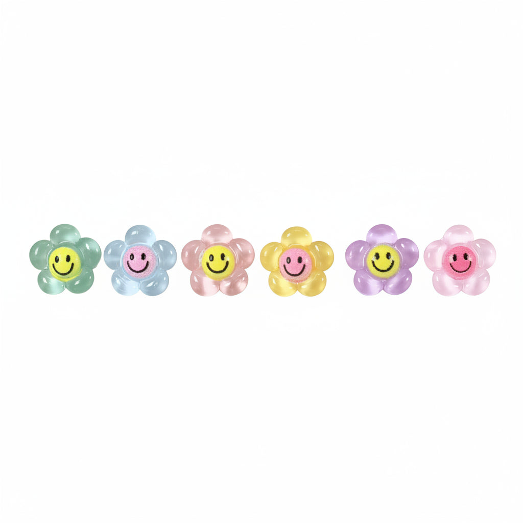 A row of smiley face flower earrings